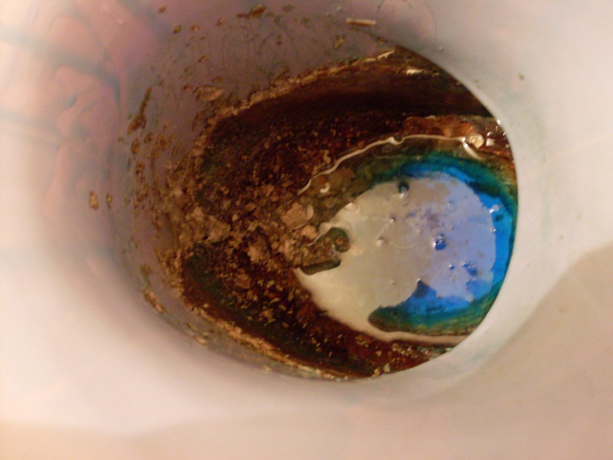 Toilet bowl with long-term mineral scale buildup